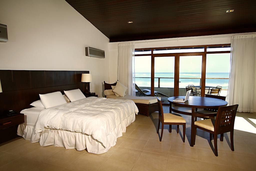 Iguana Crossing Boutique Hotel Puerto Villamil Zimmer foto